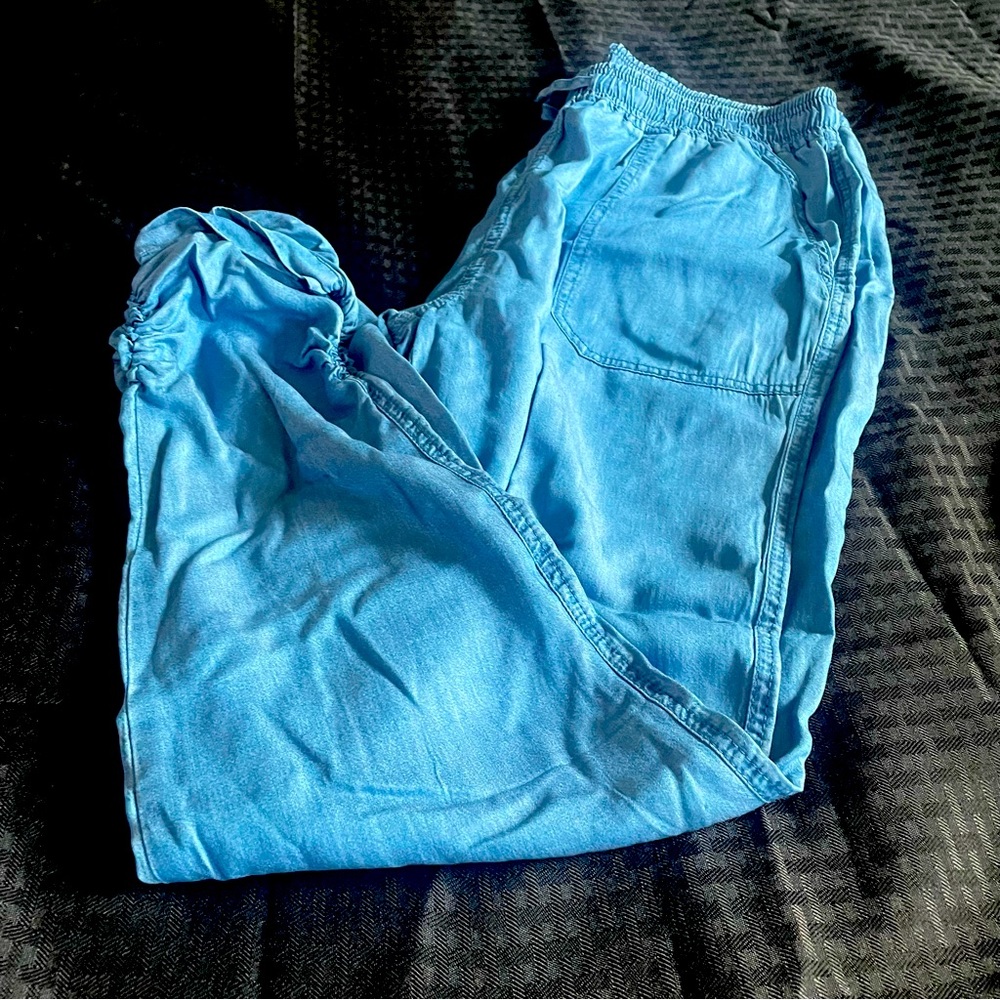 Stacked on the bottom, jean size medium brand thread supply